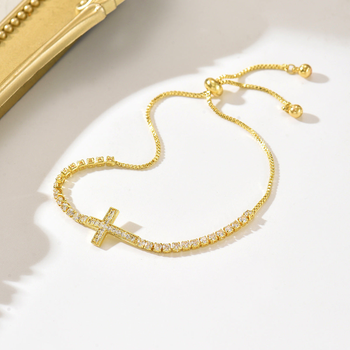 Cosima Sideways Cross Gold Bracelet