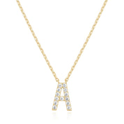 Gold cubic zirconia letter A pendant on a fine chain, on white