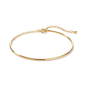 Gold half bangle bracelet with chain back on a white background