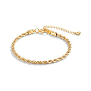 Gold twisted rope chain bracelet with extender on a white background