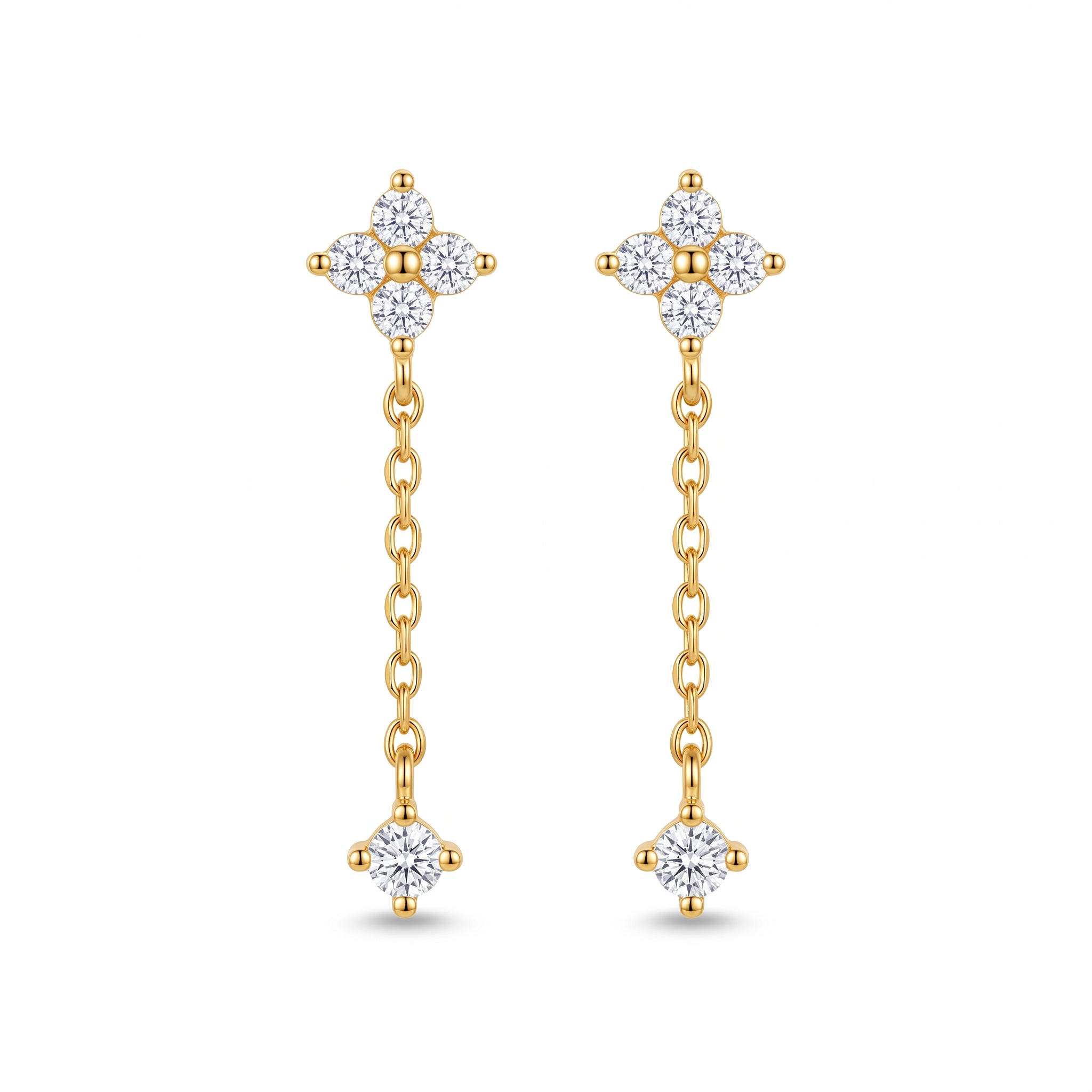 Pair of Clarisse gold clover drop earrings with crystal clover studs on white background