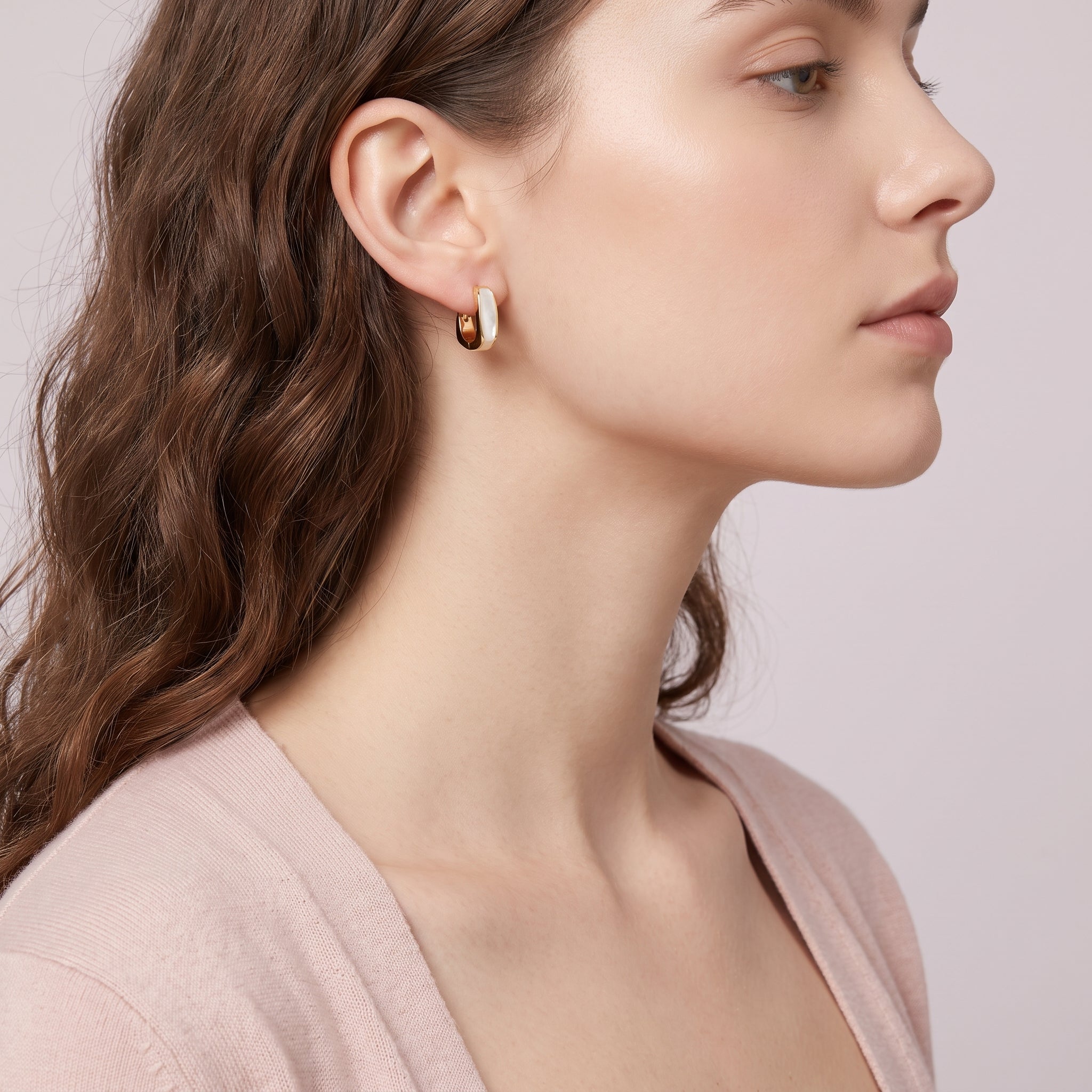 Gold square huggie earring in side profile