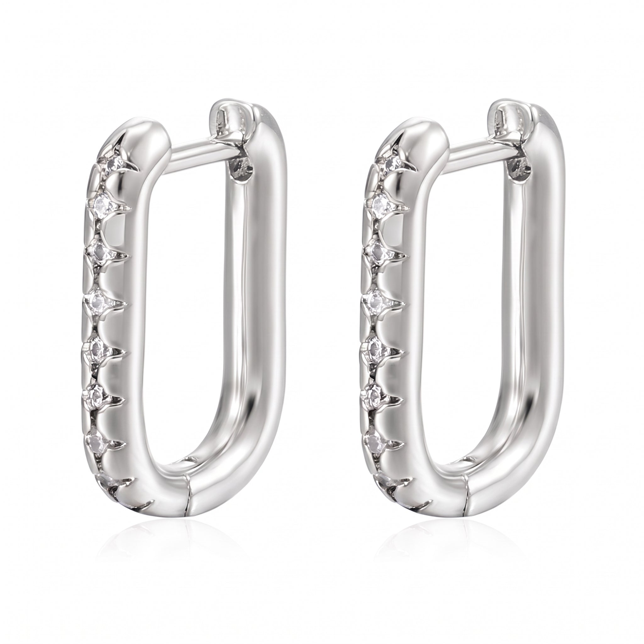 Pair of silver U hoop earrings with cubic zirconia on white