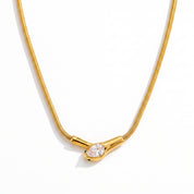 Ilsa gold snake necklace, on white