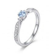 Silver light blue crystal ring with pavé marquise details on white