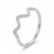 Silver wave ring on white showing the grouped crystals