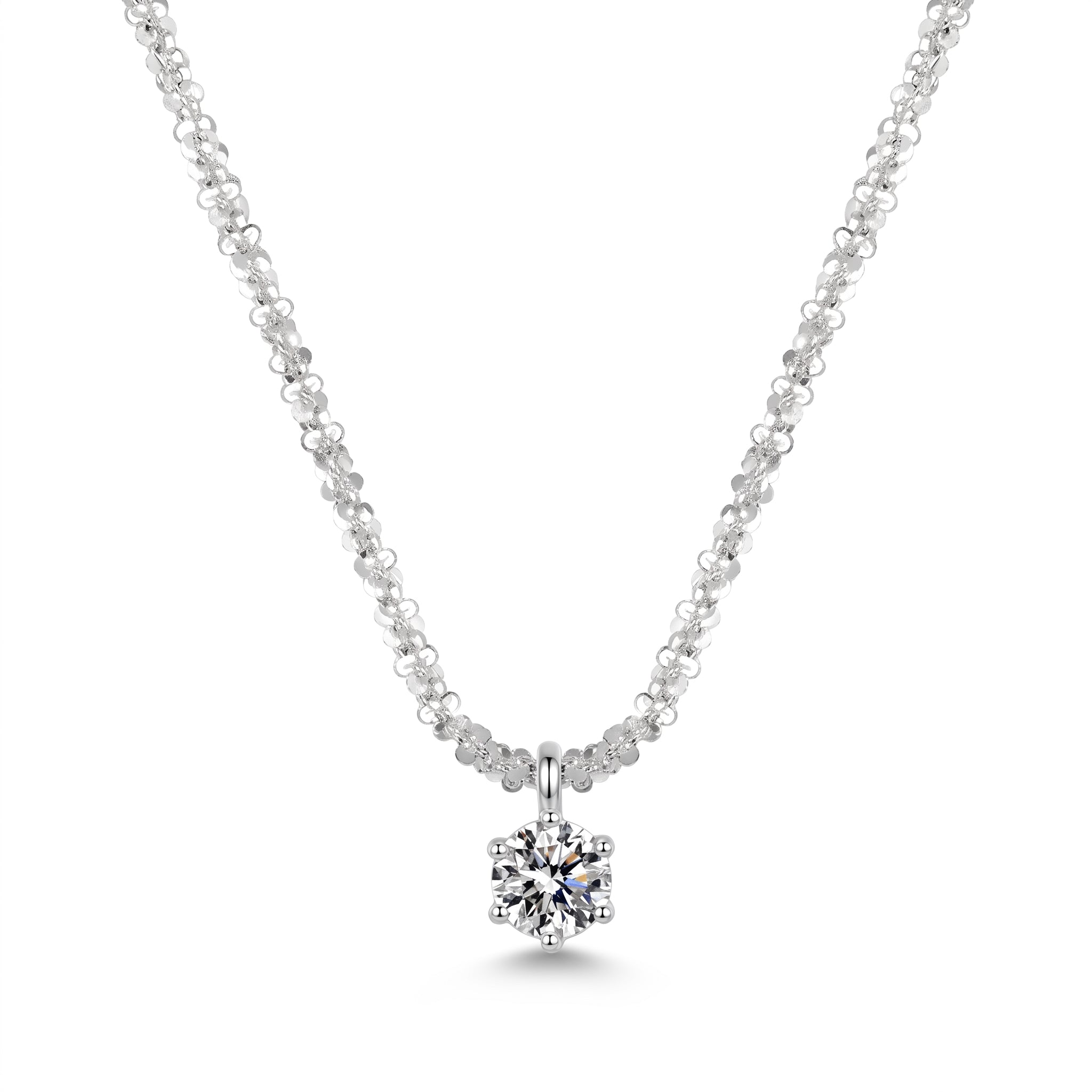 Close-up of the silver solitaire necklace's six-prong crystal on white