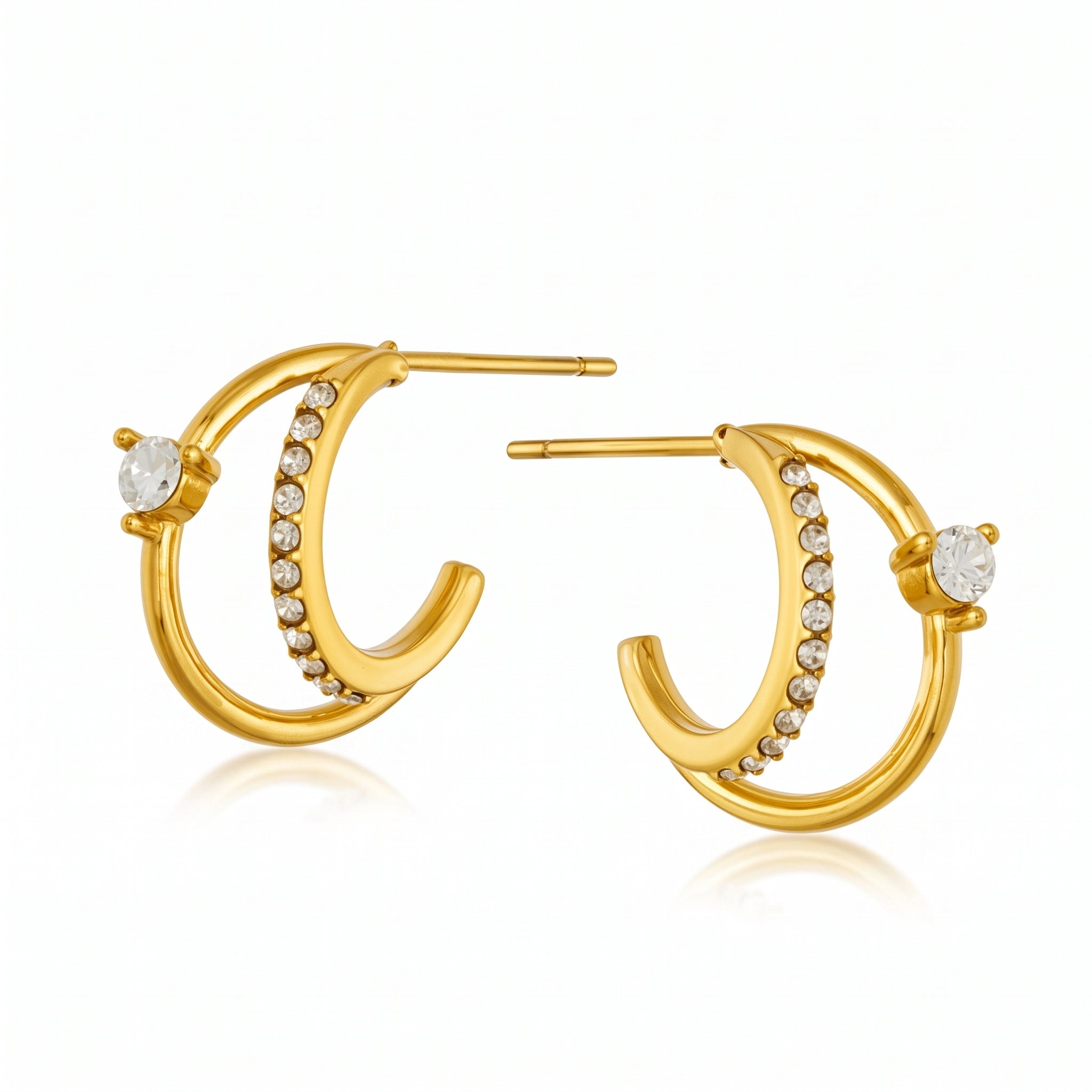 Pair of gold double hoop earrings with crystals on white