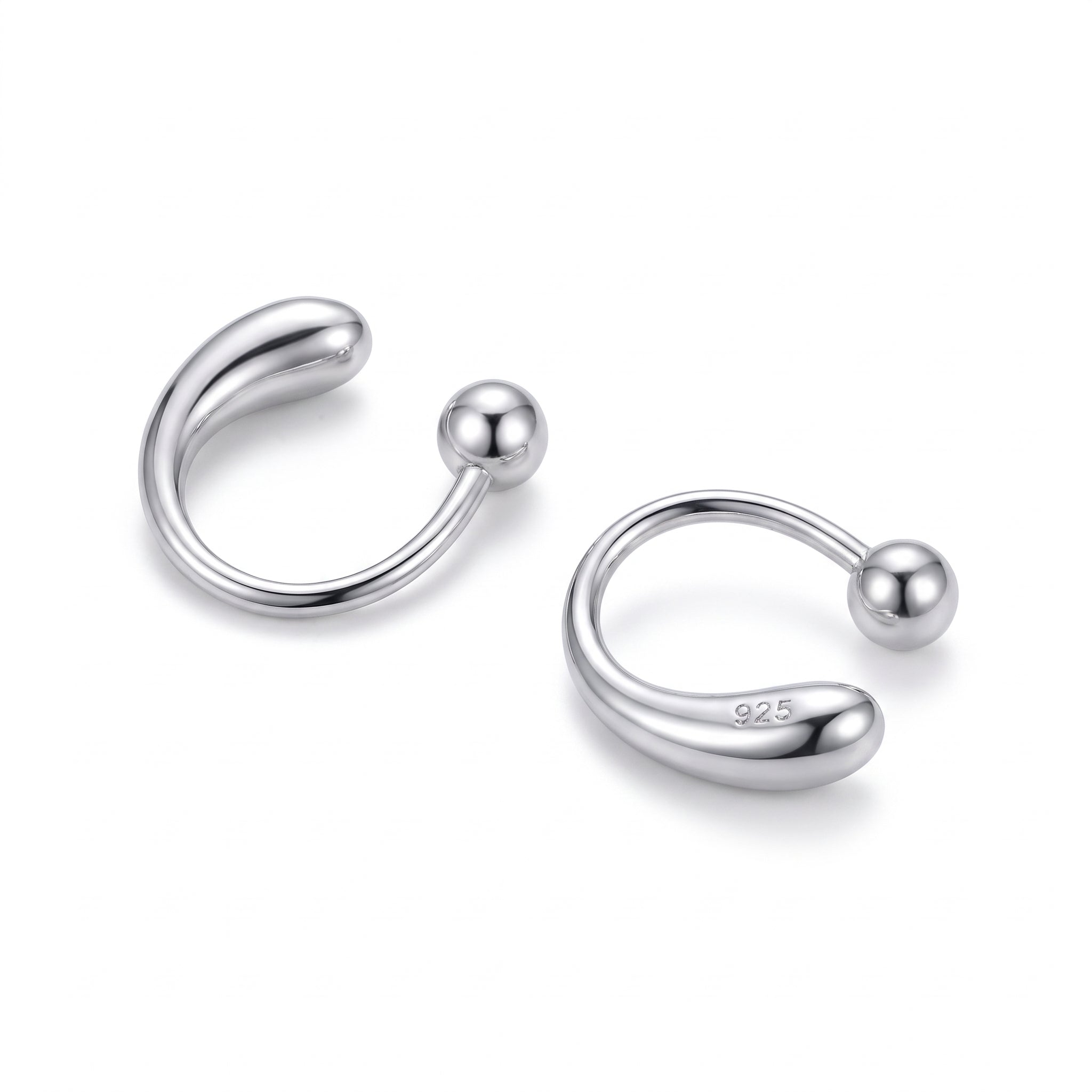 Silver open teardrop hoop earrings with ball ends on white