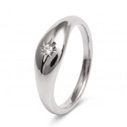 Silver star signet ring on white showing the domed top