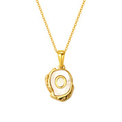 Maelle gold initial necklace, letter O on mother of pearl