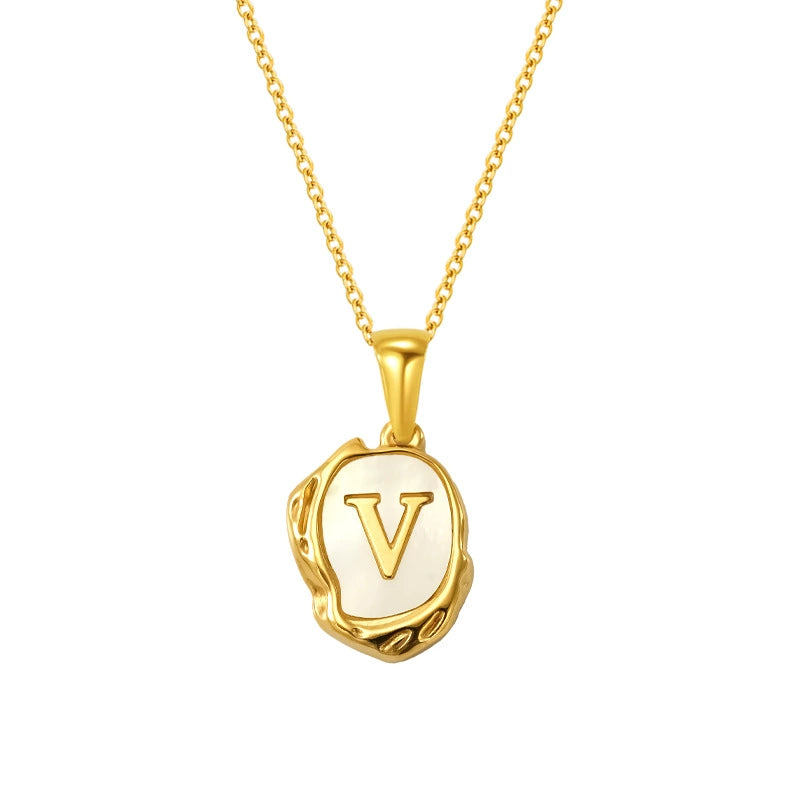 Maelle gold initial necklace, letter V on mother of pearl