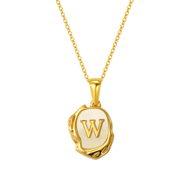 Maelle gold initial necklace, letter W on mother of pearl