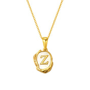 Maelle gold initial necklace, letter Z on mother of pearl