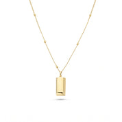 Gold bar necklace laid flat on white, beaded satellite chain