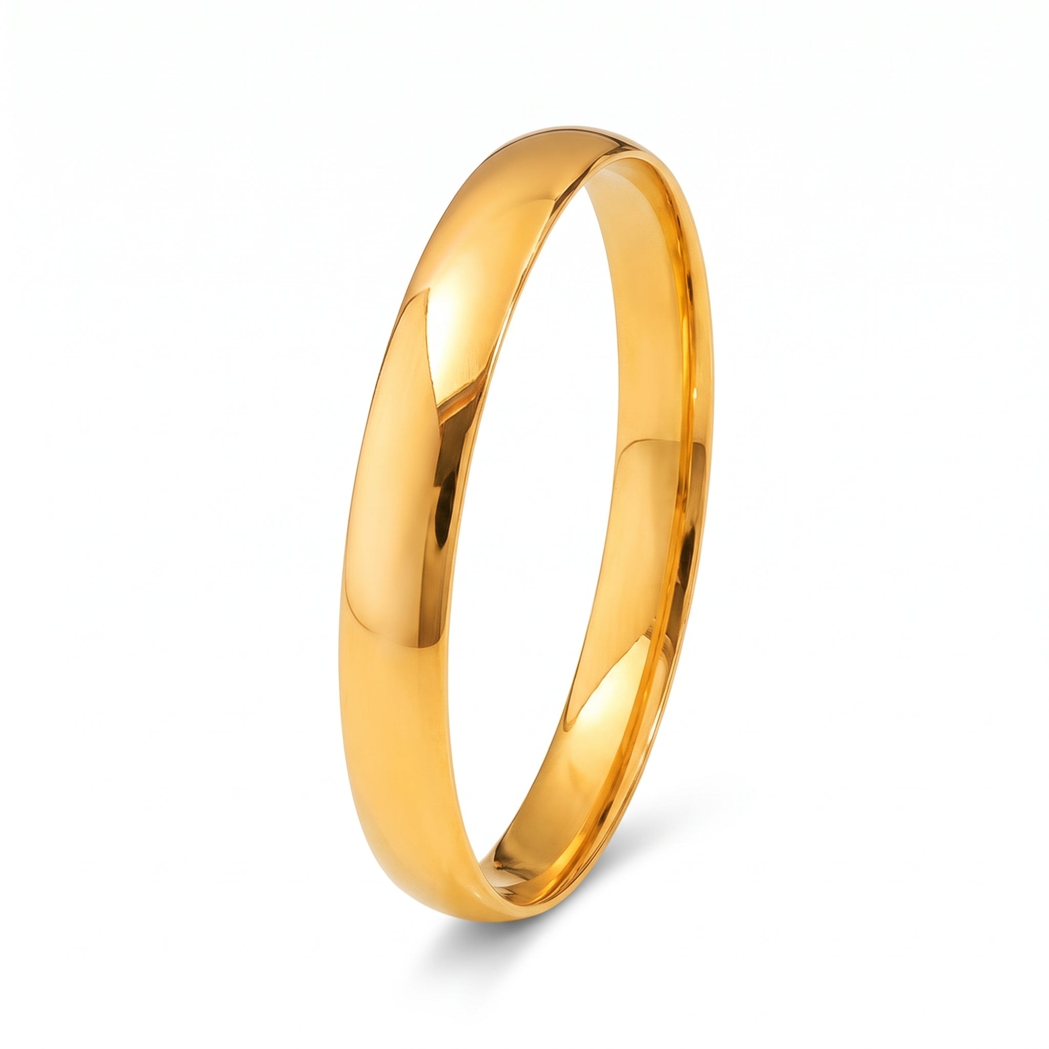 Plain polished gold bangle bracelet on white