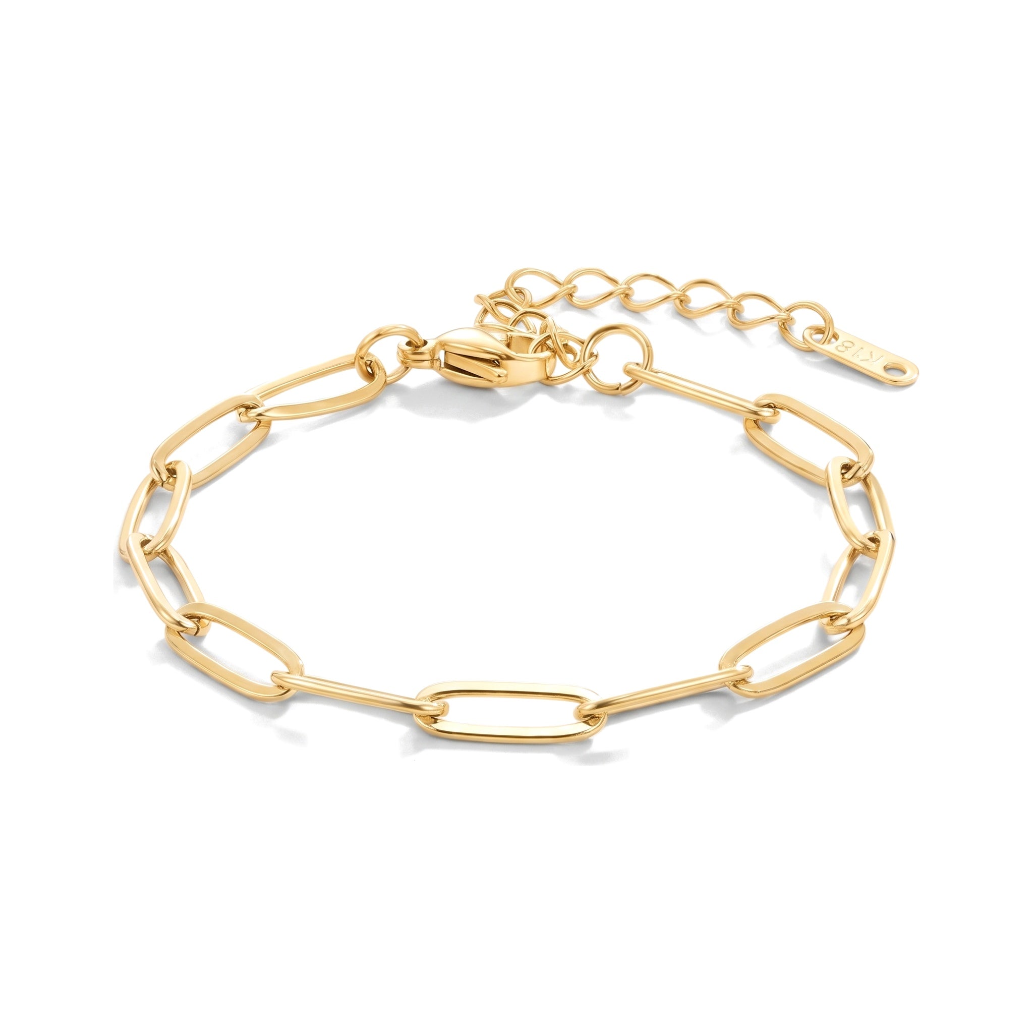 Gold paperclip chain bracelet with extender on a white background