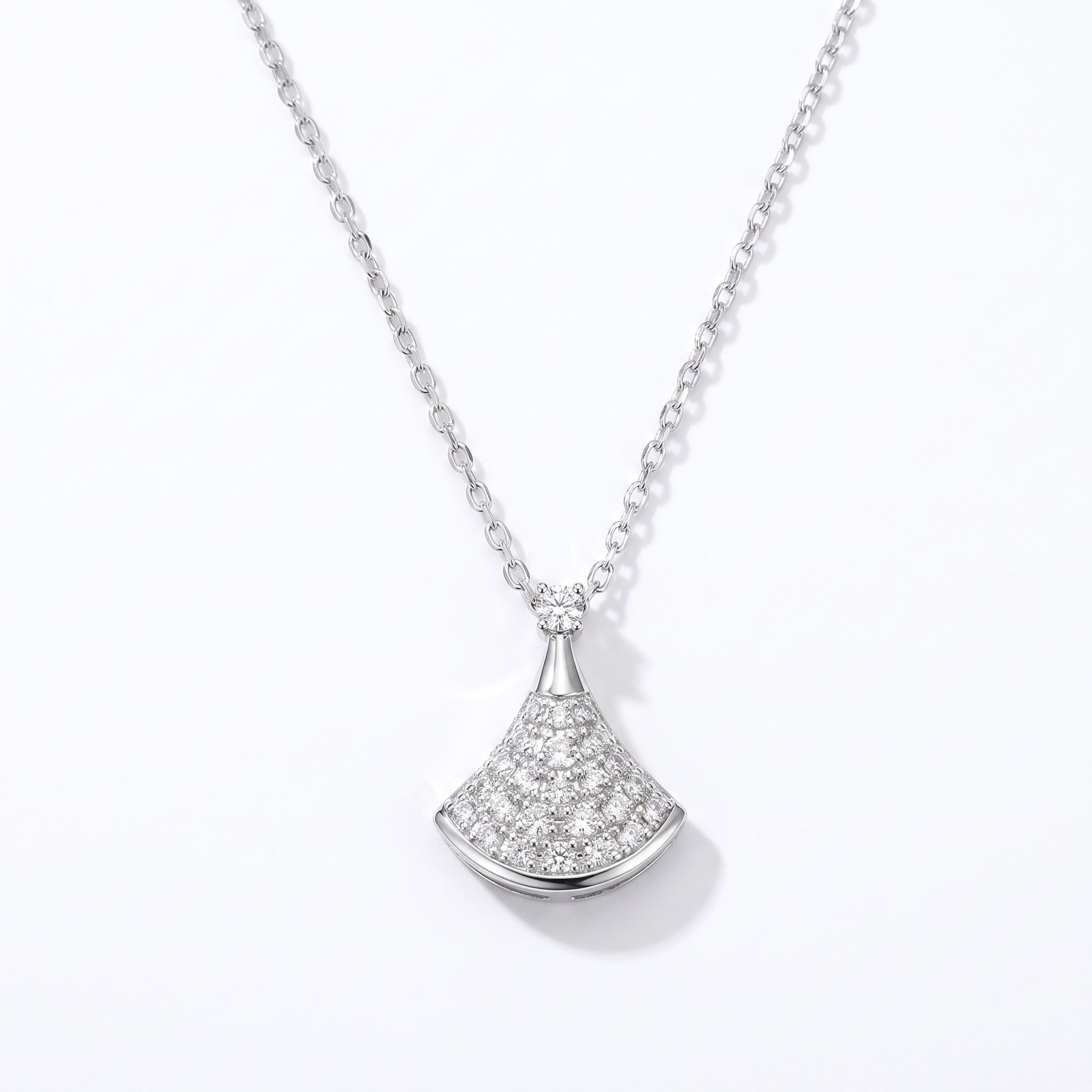 Silver pavé pendant necklace on a white background