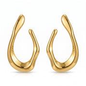Gold chunky open hoop earrings, mirrored pair on white