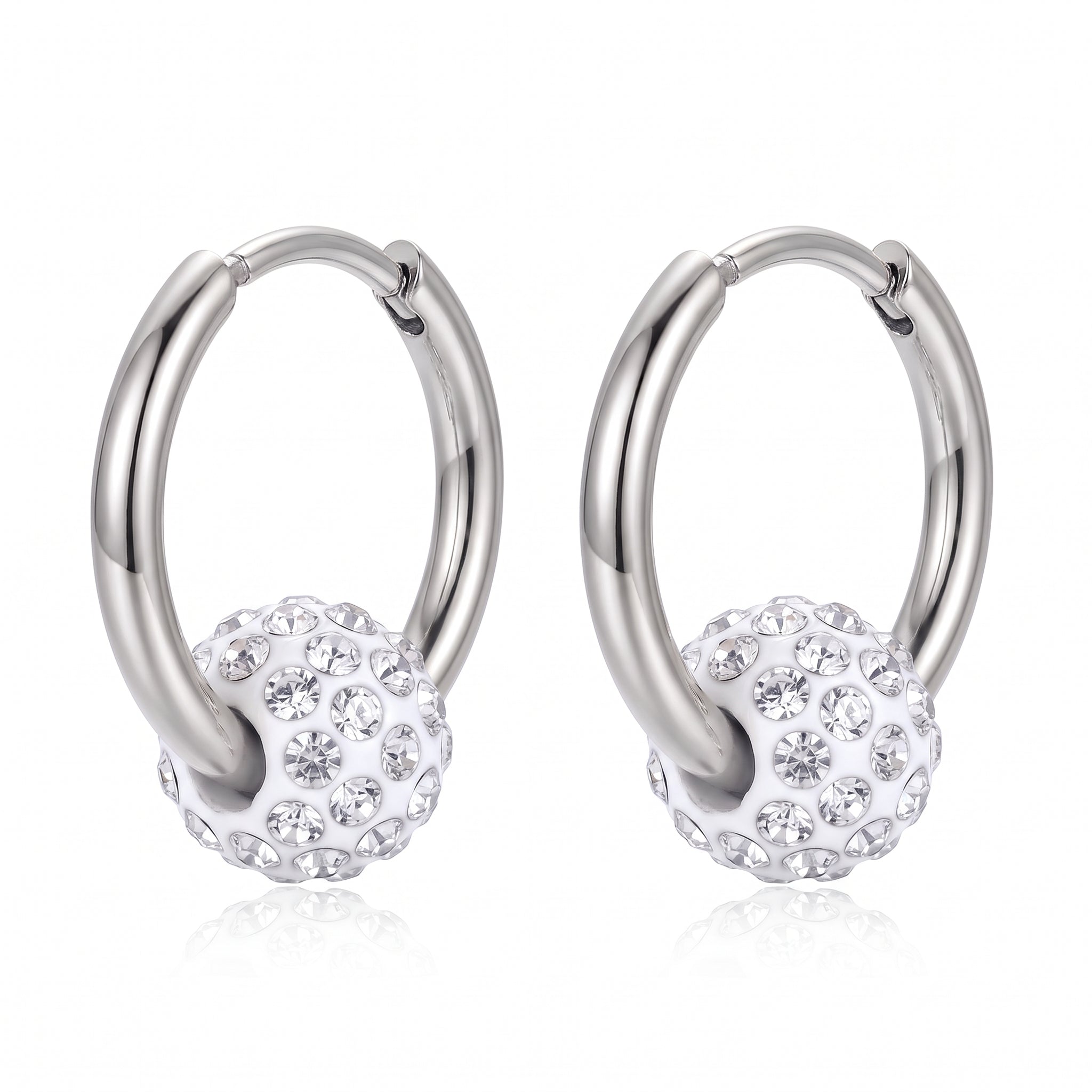 Pair of silver hoop earrings with crystal ball charms on white