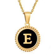 Perrine black beaded initial necklace, letter E