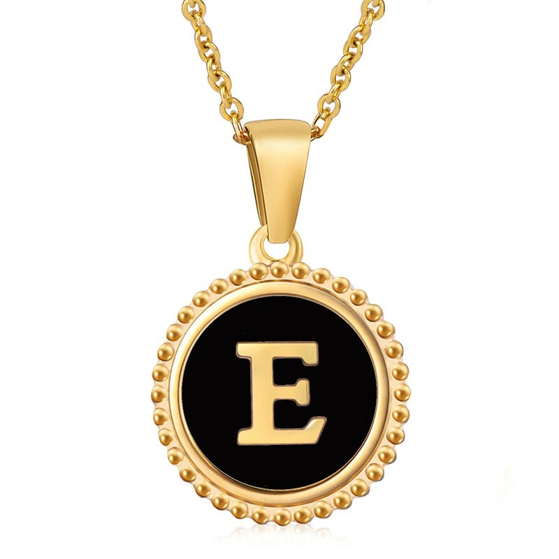 Perrine black beaded initial necklace, letter E