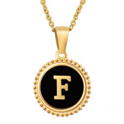 Perrine black beaded initial necklace, letter F