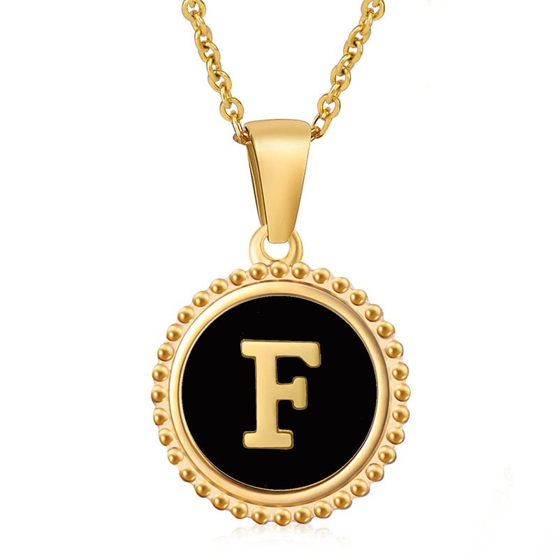 Perrine black beaded initial necklace, letter F
