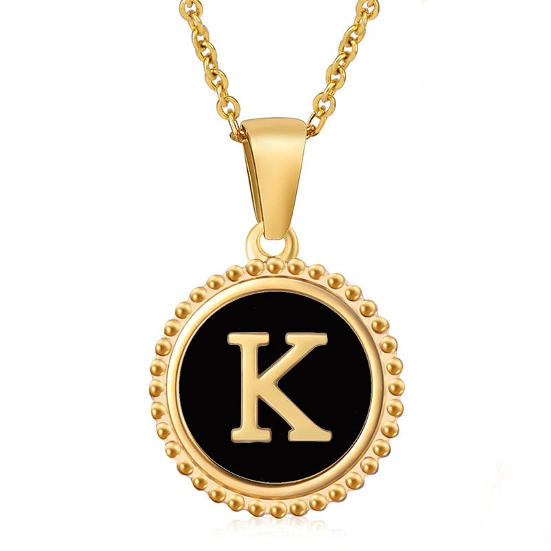 Perrine black beaded initial necklace, letter K