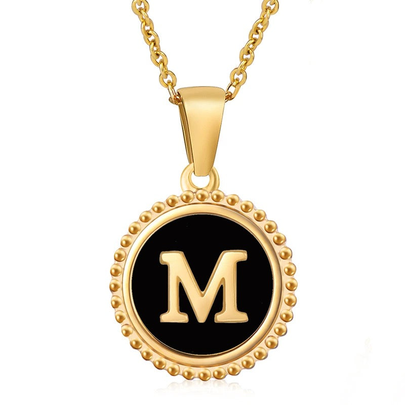 Perrine black beaded initial necklace, letter M