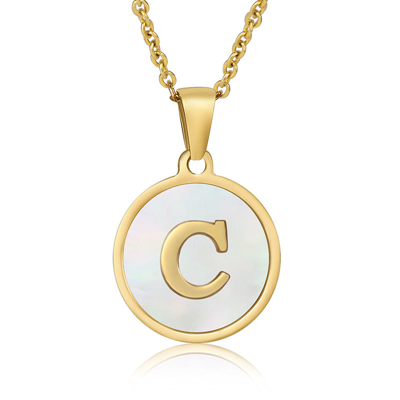 Perrine gold initial disc necklace, letter C on mother of pearl