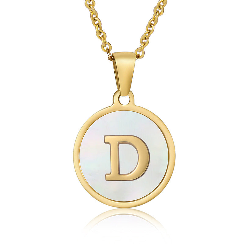 Perrine gold initial disc necklace, letter D on mother of pearl