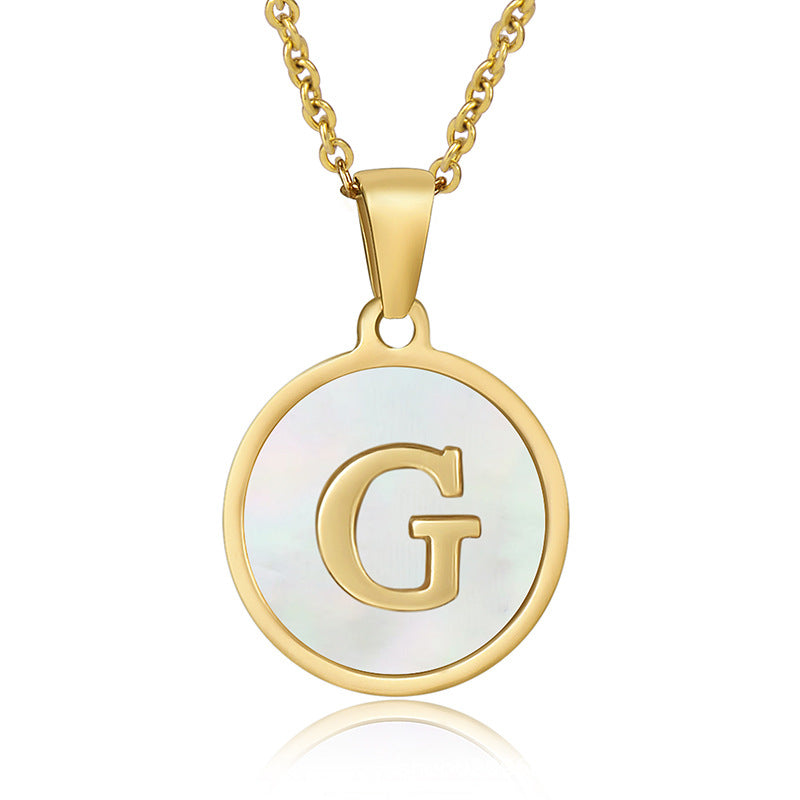 Perrine gold initial disc necklace, letter G on mother of pearl