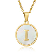 Perrine gold initial disc necklace, letter I on mother of pearl
