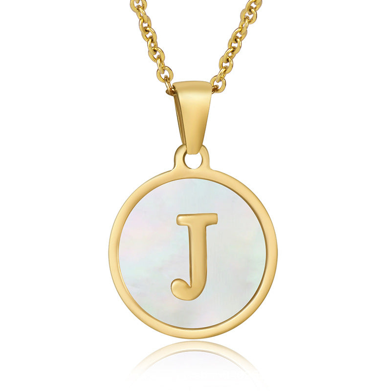 Perrine gold initial disc necklace, letter J on mother of pearl