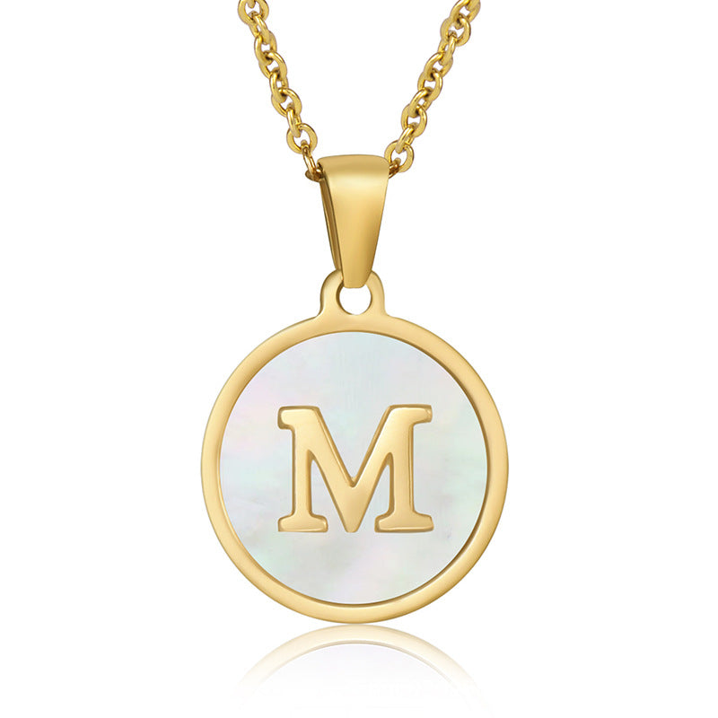 Perrine gold initial disc necklace, letter M on mother of pearl