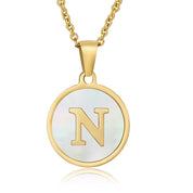 Perrine gold initial disc necklace, letter N on mother of pearl