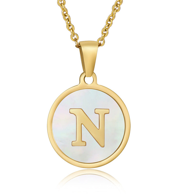 Perrine gold initial disc necklace, letter N on mother of pearl