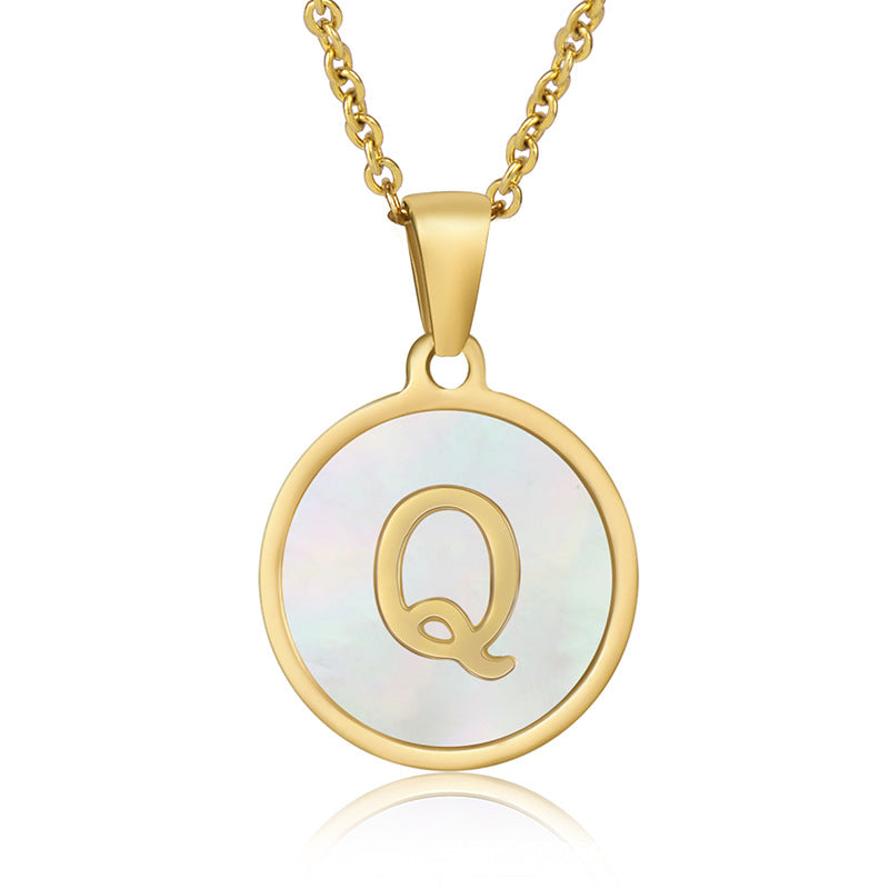 Perrine gold initial disc necklace, letter Q on mother of pearl