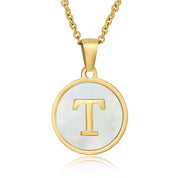 Perrine gold initial disc necklace, letter T on mother of pearl