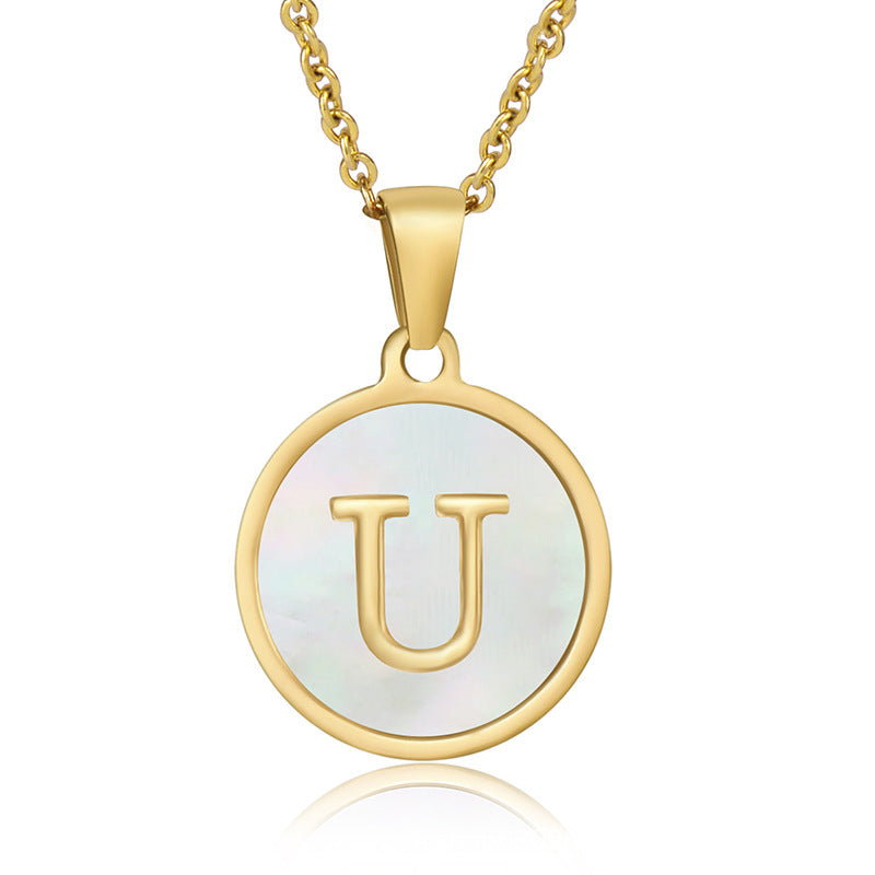 Perrine gold initial disc necklace, letter U on mother of pearl