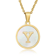 Perrine gold initial disc necklace, letter Y on mother of pearl