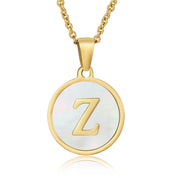 Perrine gold initial disc necklace, letter Z on mother of pearl