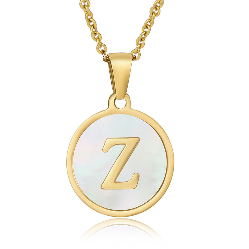 Perrine gold initial disc necklace, letter Z on mother of pearl