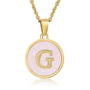 Perrine pink initial disc necklace, letter G on pink mother of pearl