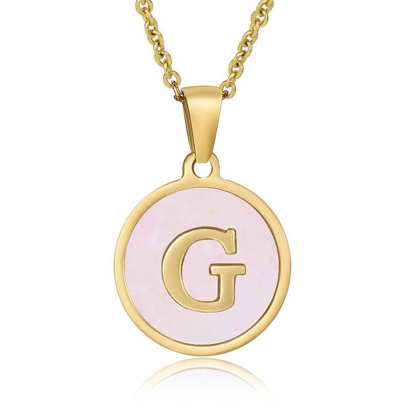 Perrine pink initial disc necklace, letter G on pink mother of pearl