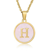 Perrine pink initial disc necklace, letter H on pink mother of pearl