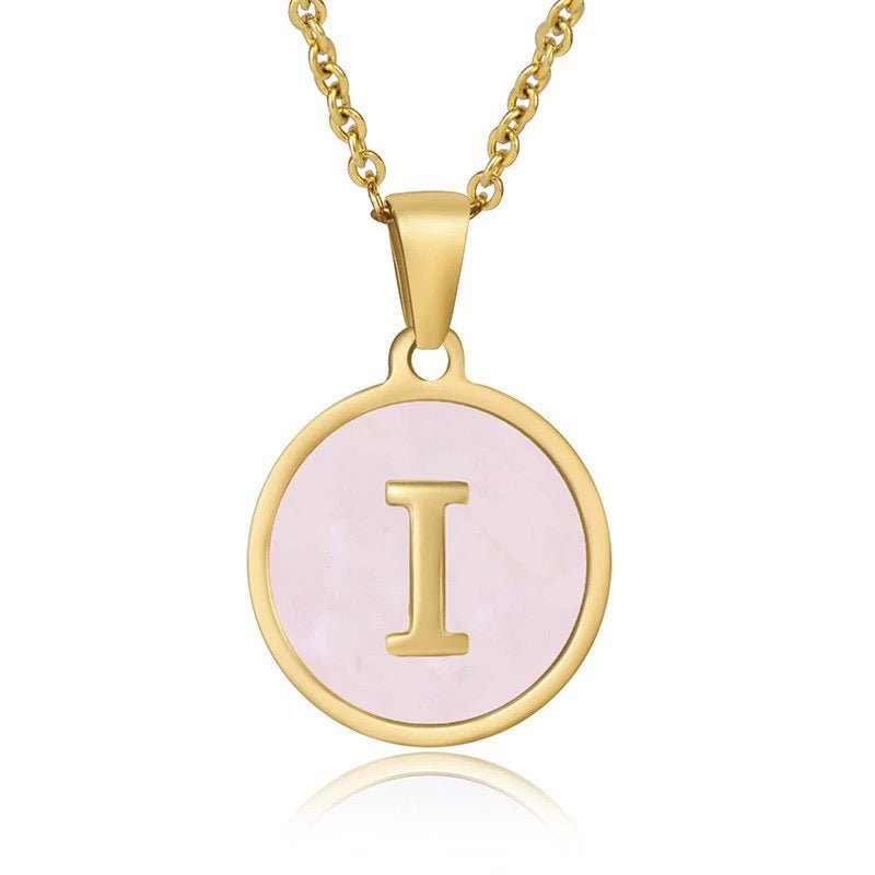 Perrine pink initial disc necklace, letter I on pink mother of pearl