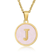 Perrine pink initial disc necklace, letter J on pink mother of pearl