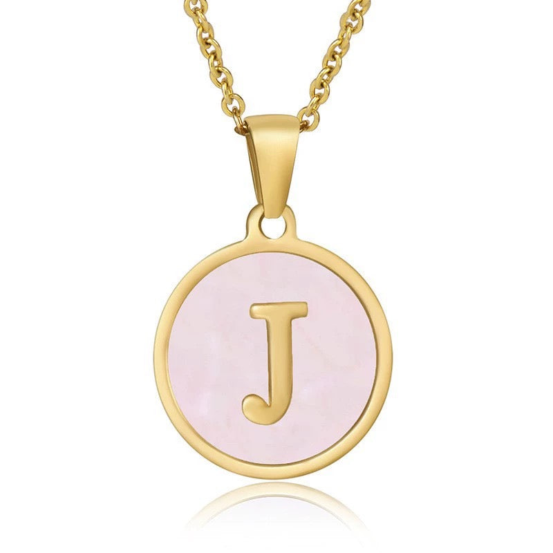 Perrine pink initial disc necklace, letter J on pink mother of pearl